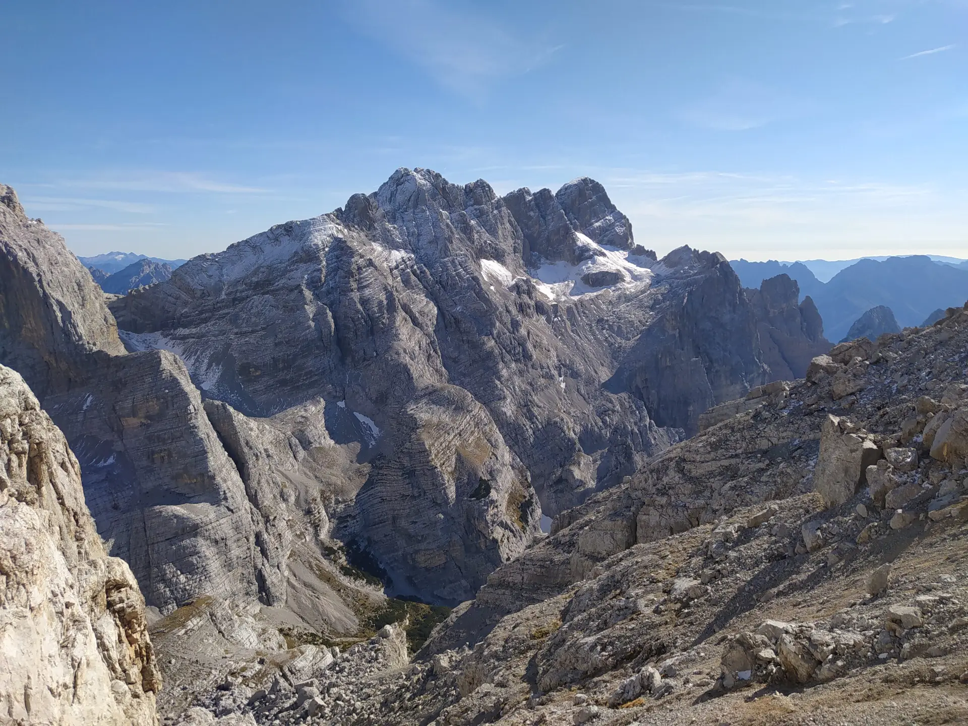 Very mineral mountainous landscape of dolomites in Italy, summits are slightly snowy.