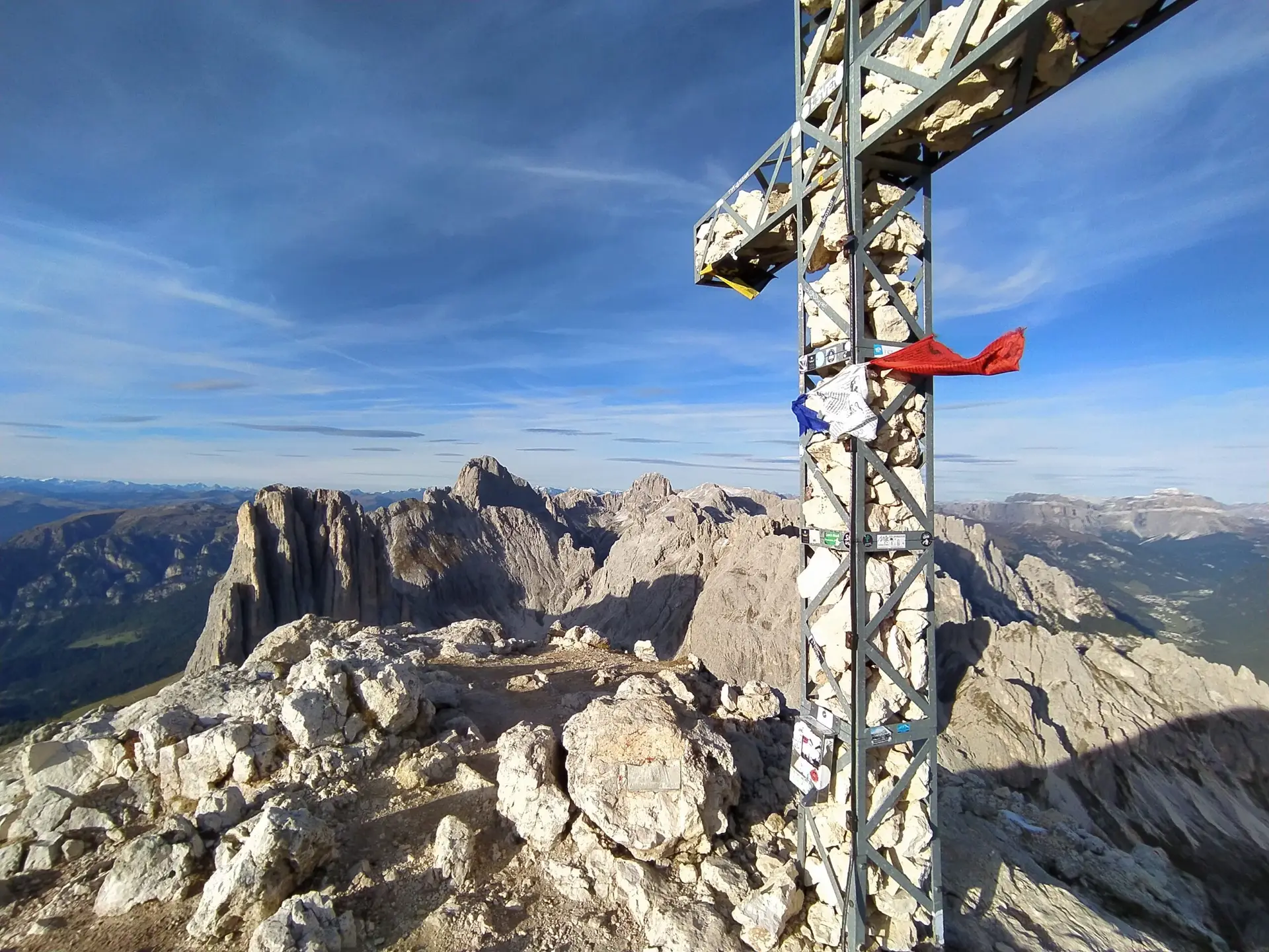 The cross at the summit of Roda di Vael aka Rotwund in Dolomites, during a base jumping expedition in Italy with BASE Spirit.