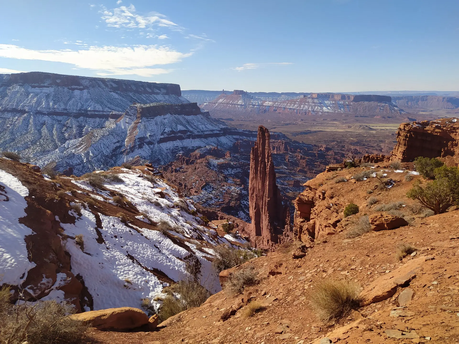 View on the Titan Tower cliff. The snowy surrounding mountains are simply breathtaking.